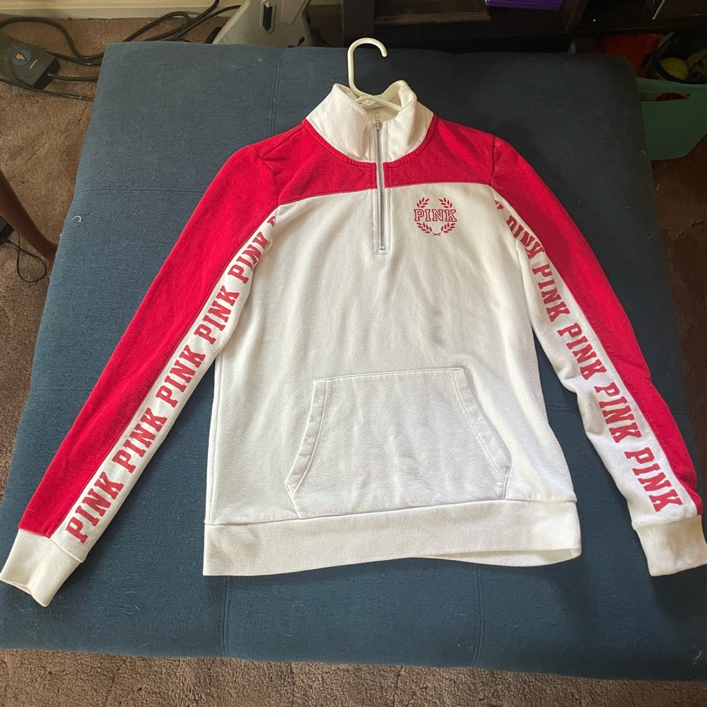 Pink 1/4 zip size XS but runs bigger